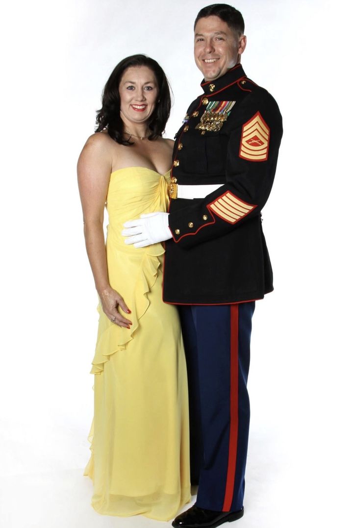MSgt Patton in Marine Corps dress blues with Nikki in a yellow gown